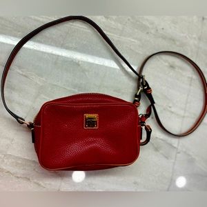 Deep red Dooney & Bourke pebble Grain Camera crossbody bag
